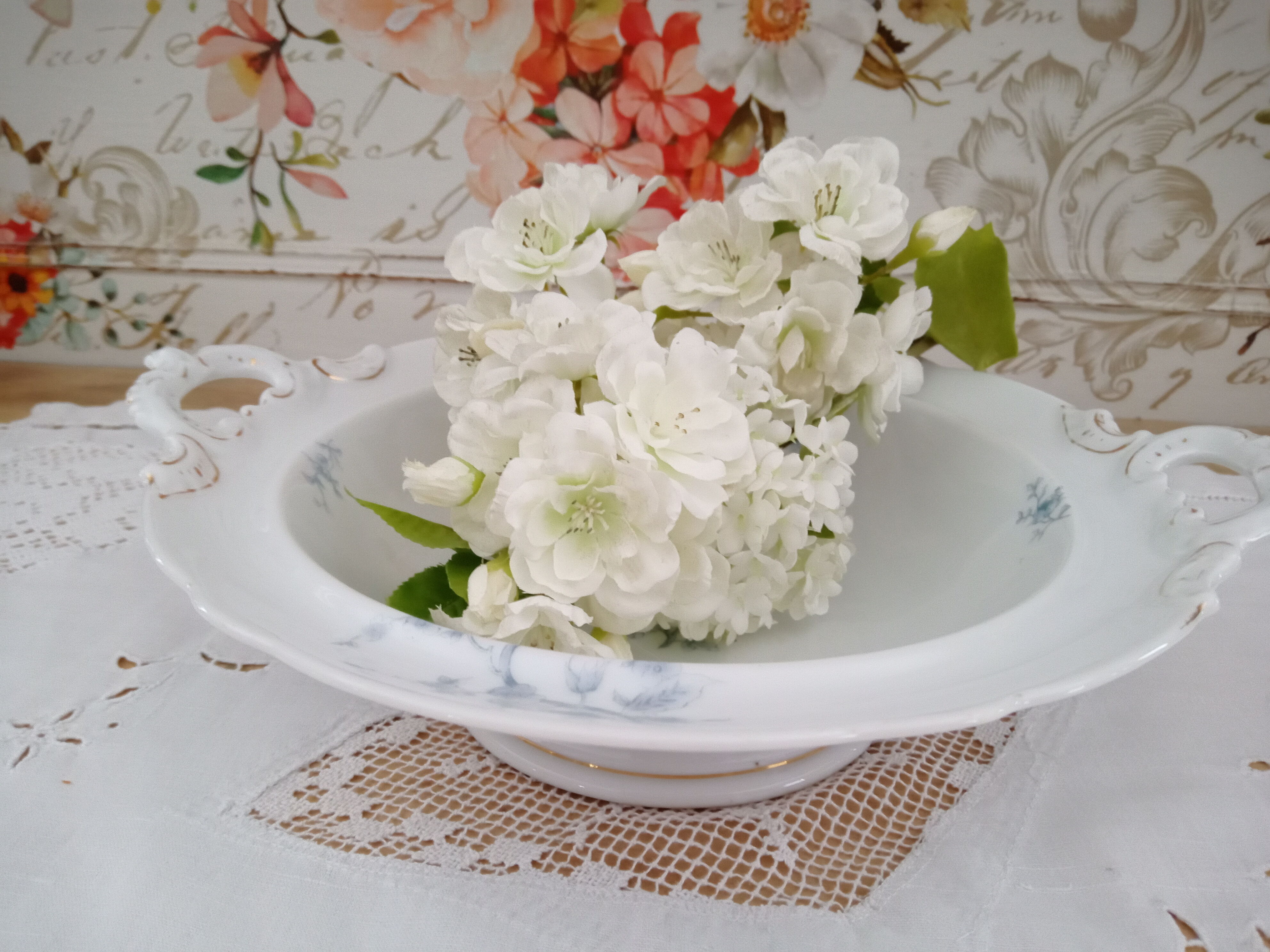 Compotier on porcelain pedestal decoration pale blue flowers