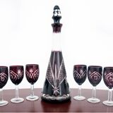 Crystal decanter in maroon color with glasses, Poland, 1960s