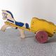 Horse cart and cart, old wooden pull toy.