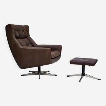 Années 1970, chaise pivotante danoise avec repose-pieds, bon état d'origine, cuir.