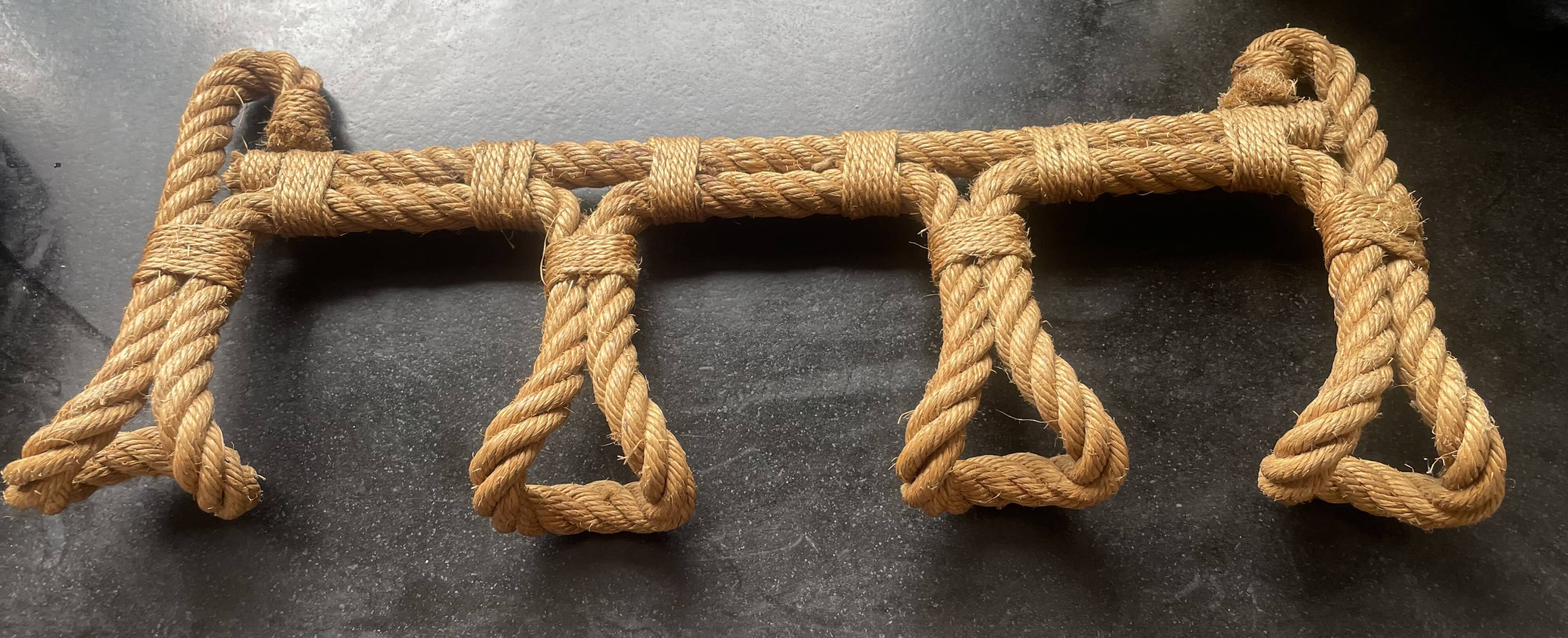 vintage wall coat rack in braided rope