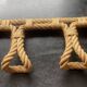 vintage wall coat rack in braided rope