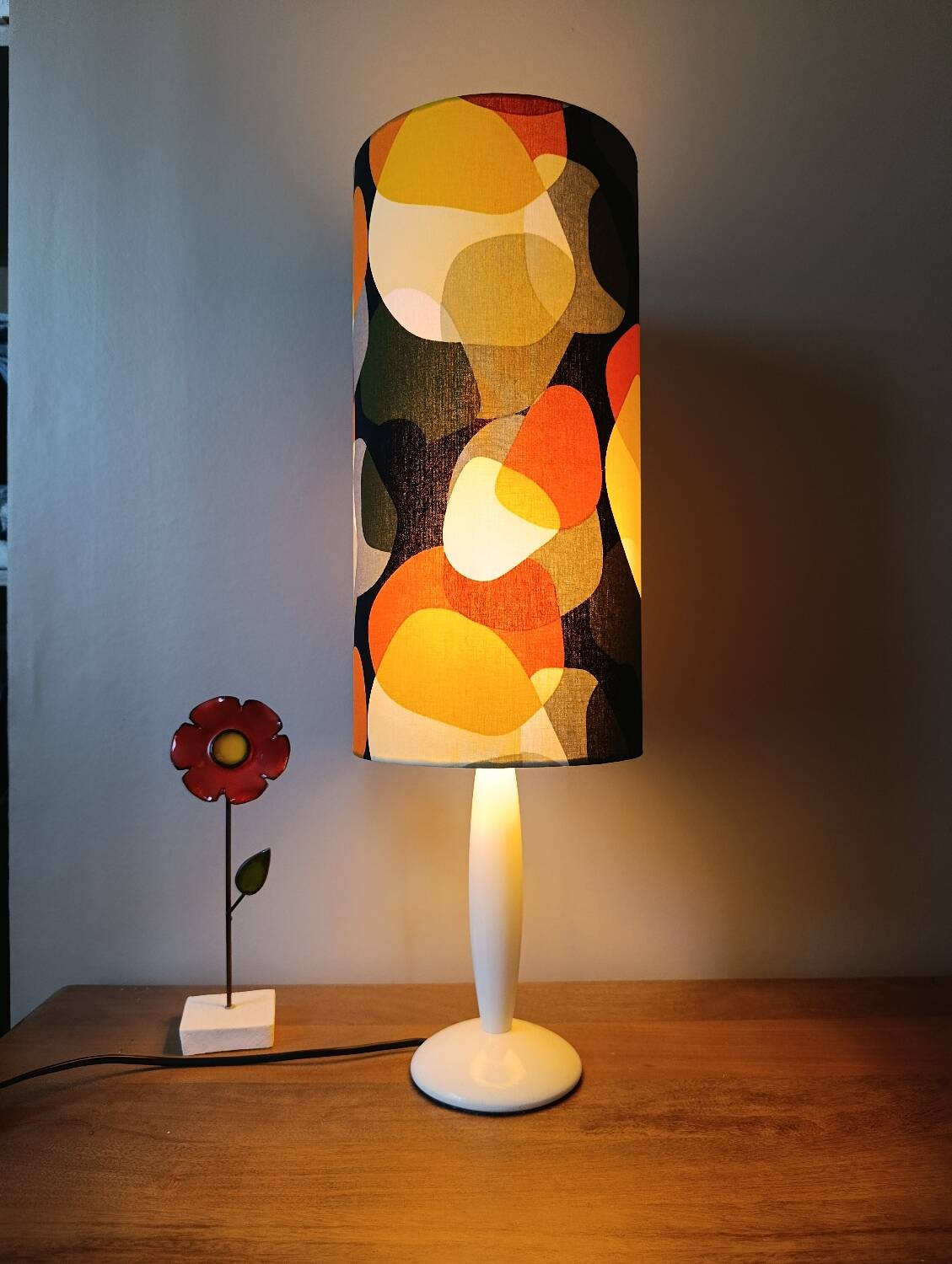 vintage lamp with a white wooden base, multicoloured sixties lampshade