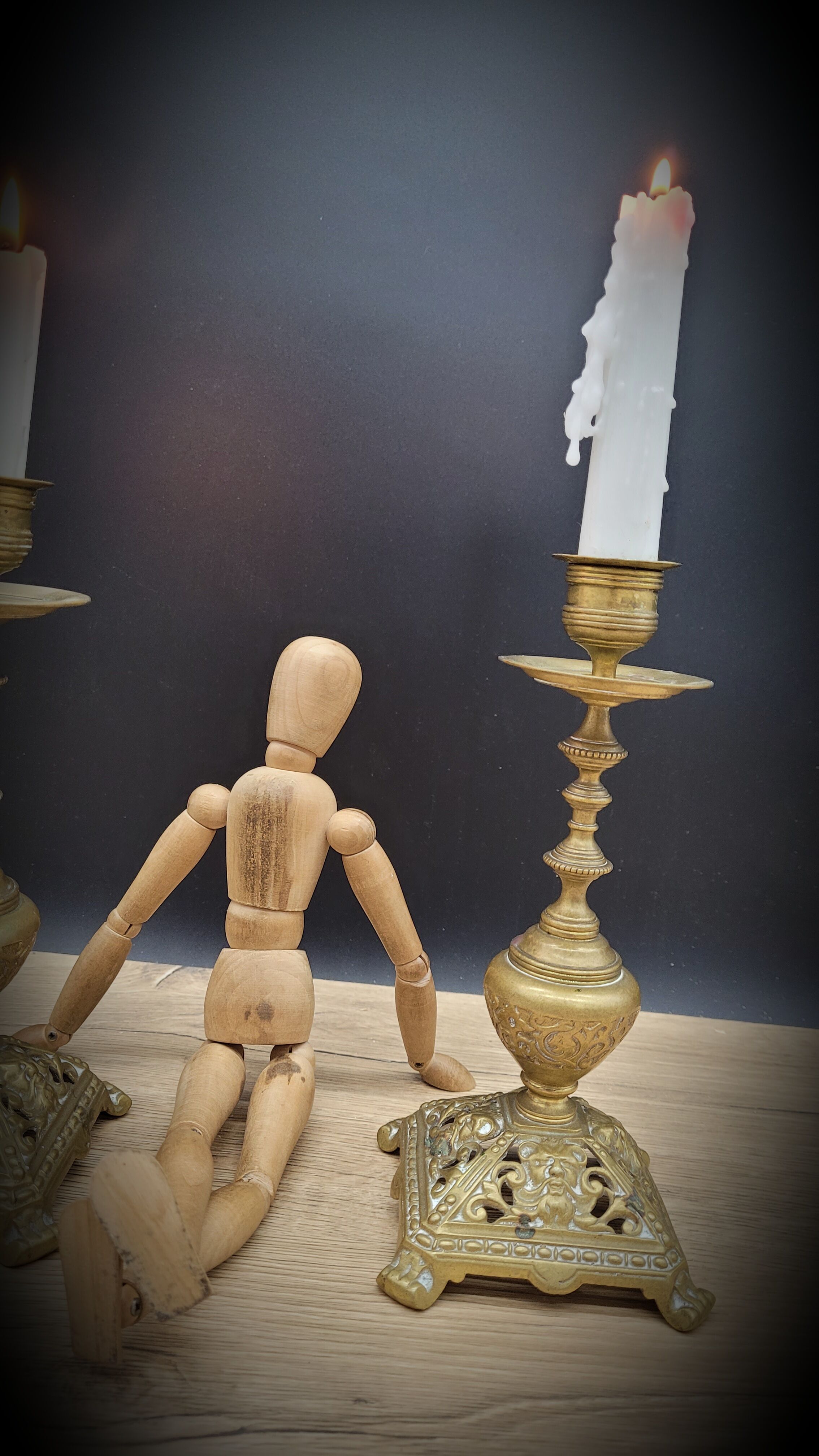 Duo worked brass candle holders