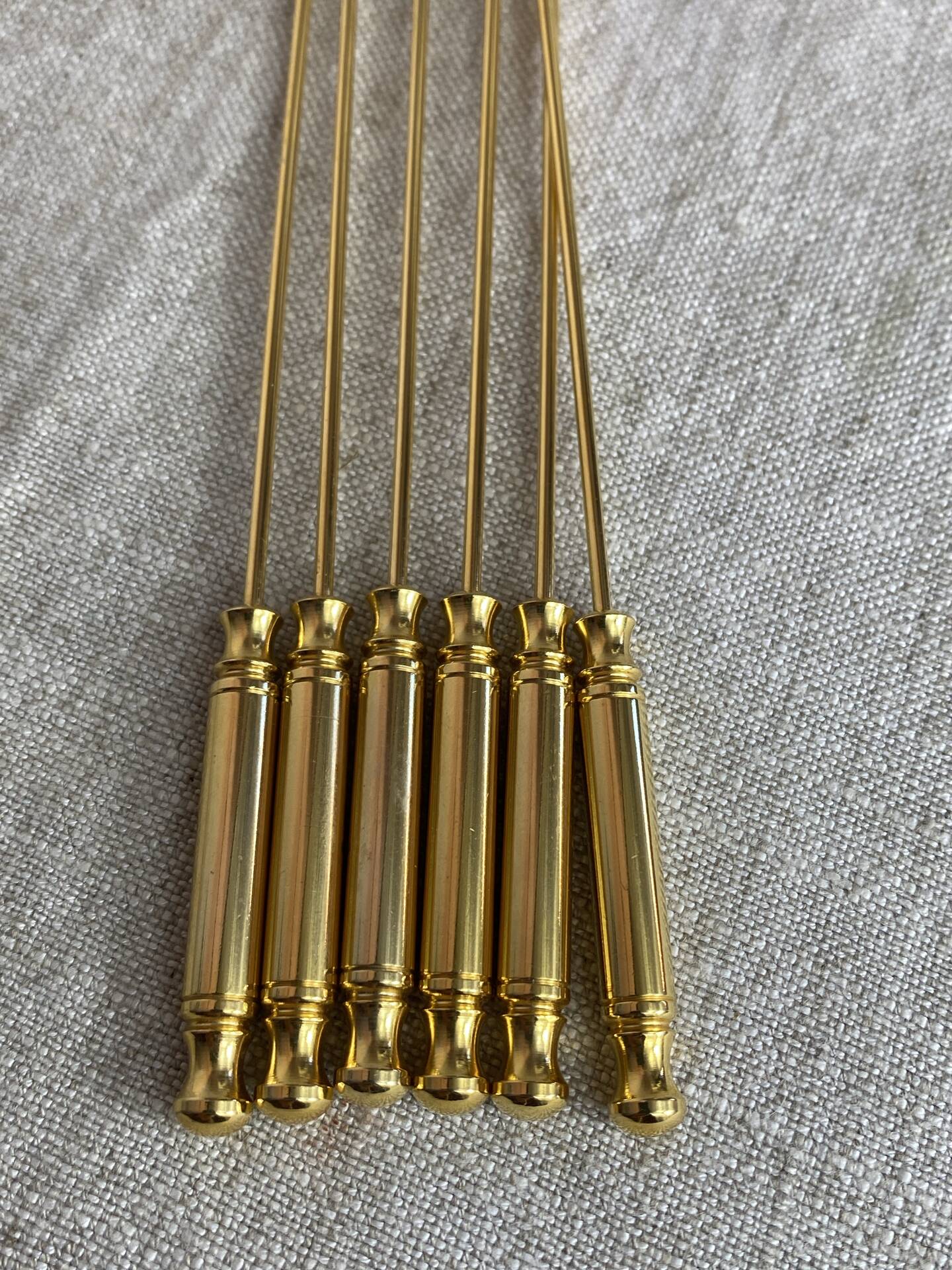 Long coffee or cocktail spoons in gold plating