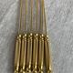 Long coffee or cocktail spoons in gold plating