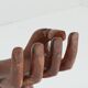 Sculptural wooden hand chair
