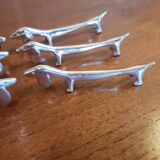 Six silver metal knife holders basset hound