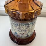 Oil lamp in amber glass, early twentieth century