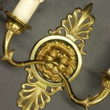 Pair of sconces, lion heads and arrows, Empire style