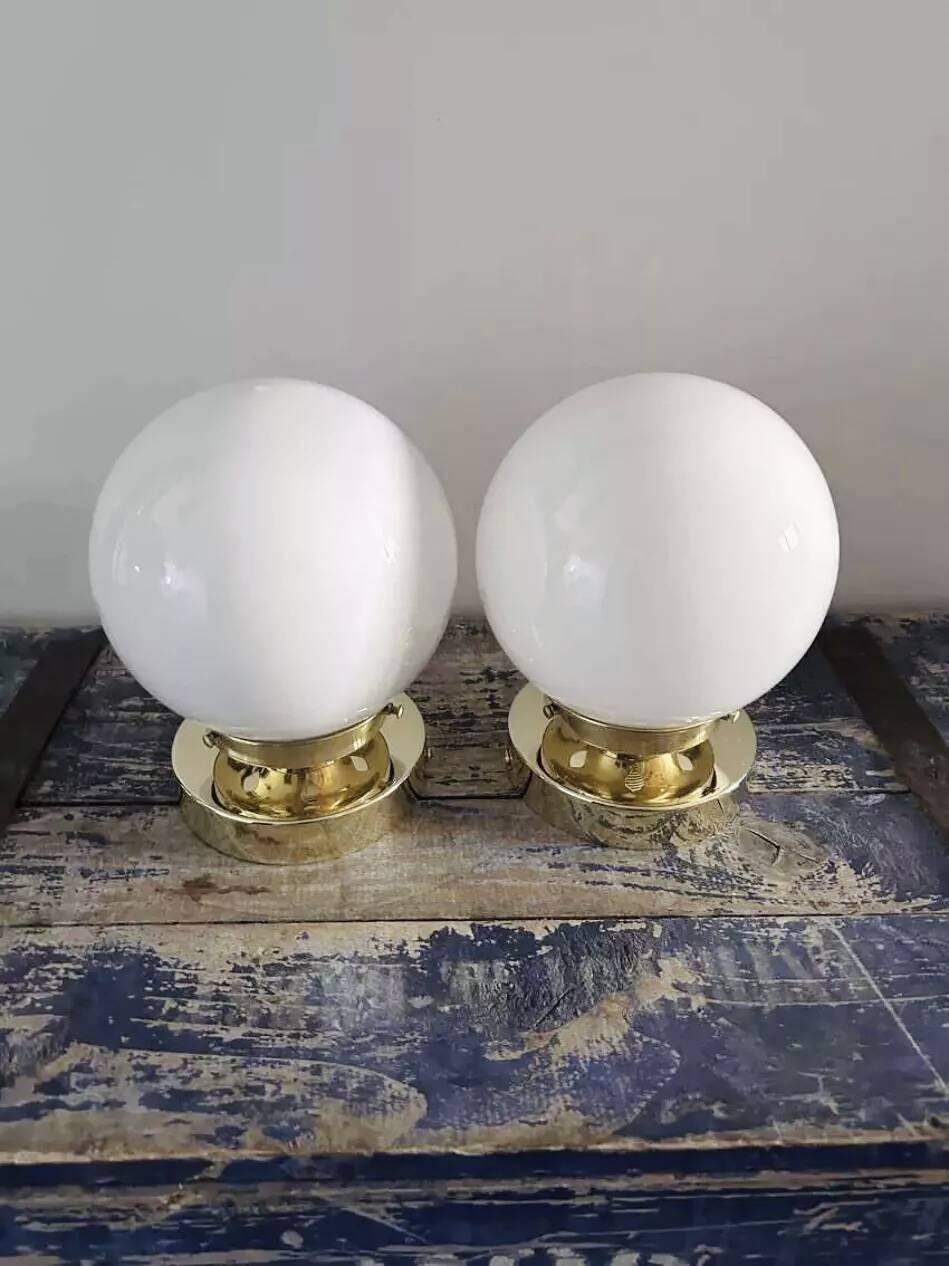 Pair of white opaline globe wall lights