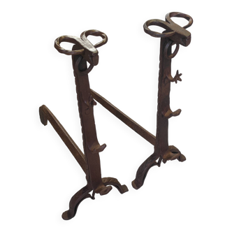 Pair of zoomorphic andirons with ram's head, late 17th century.