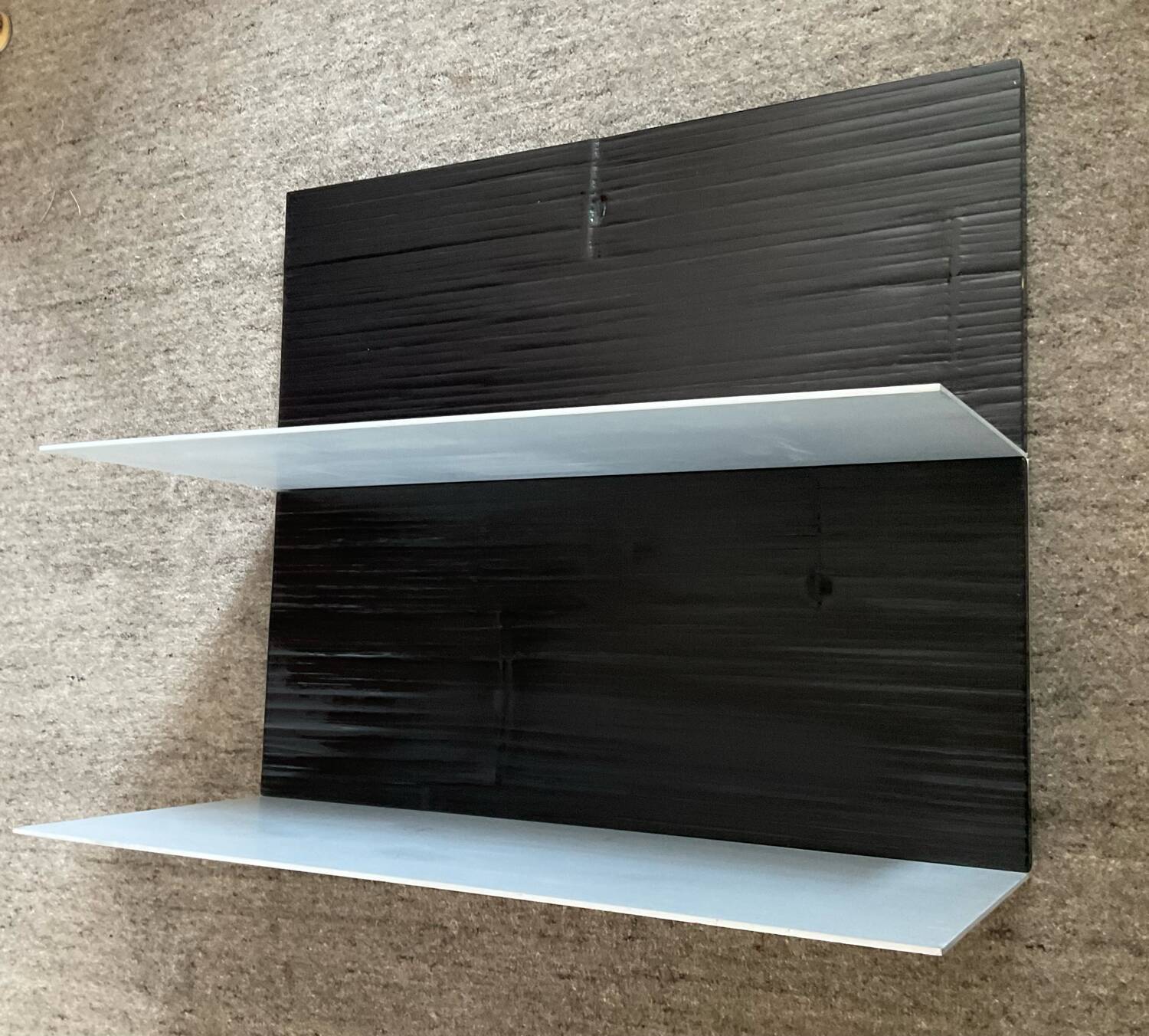 Pair of contemporary shelves in steel and stained wood