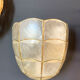 Applique nacre et laiton