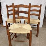 Brutalist chairs in walnut and straw