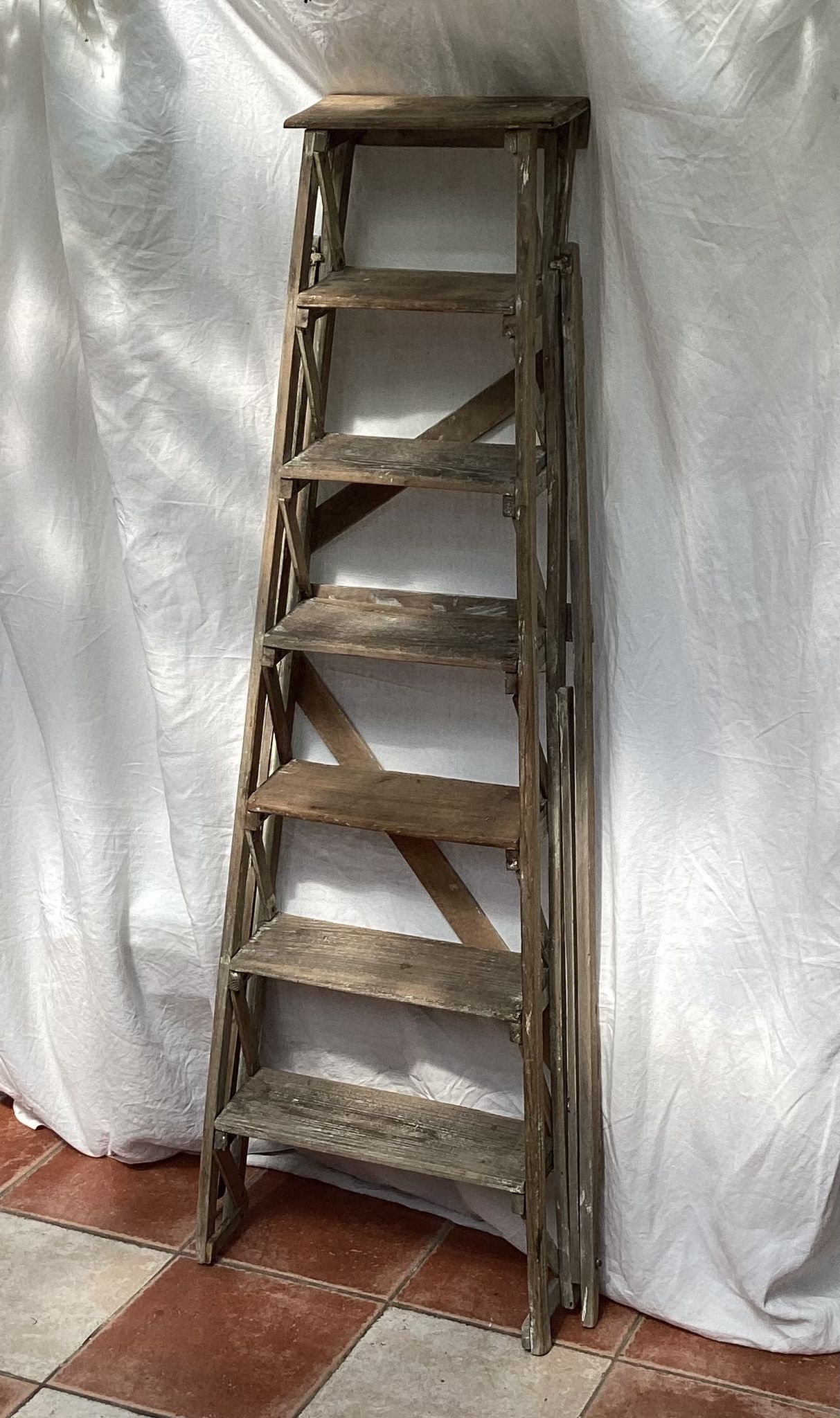Wooden painter's stepladder in the middle of XX century foldable