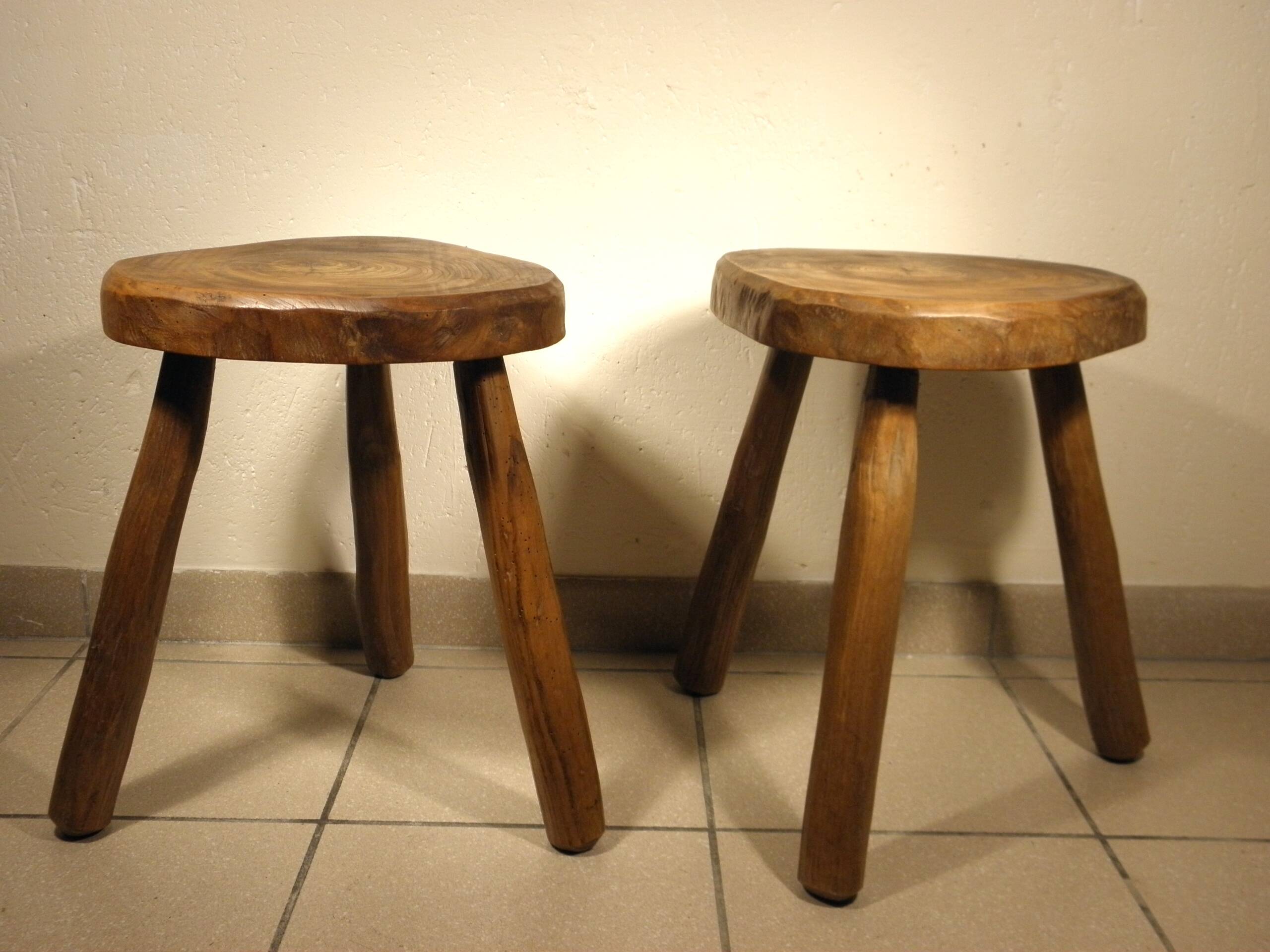 Pair of wooden tripod stools