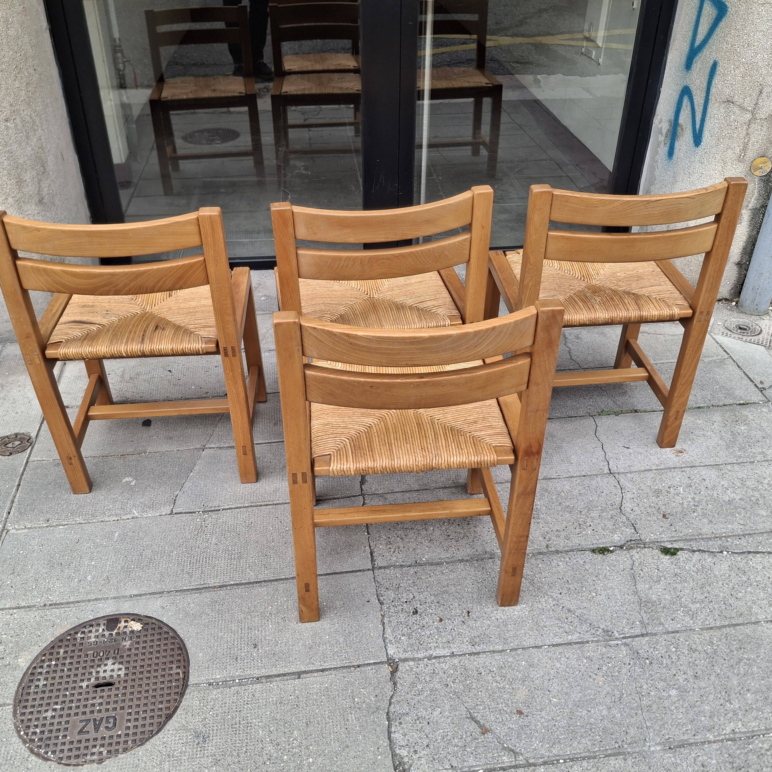 Set of four regaining chairs in elm. 1970