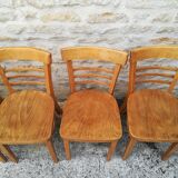 12 varnished bistro chairs