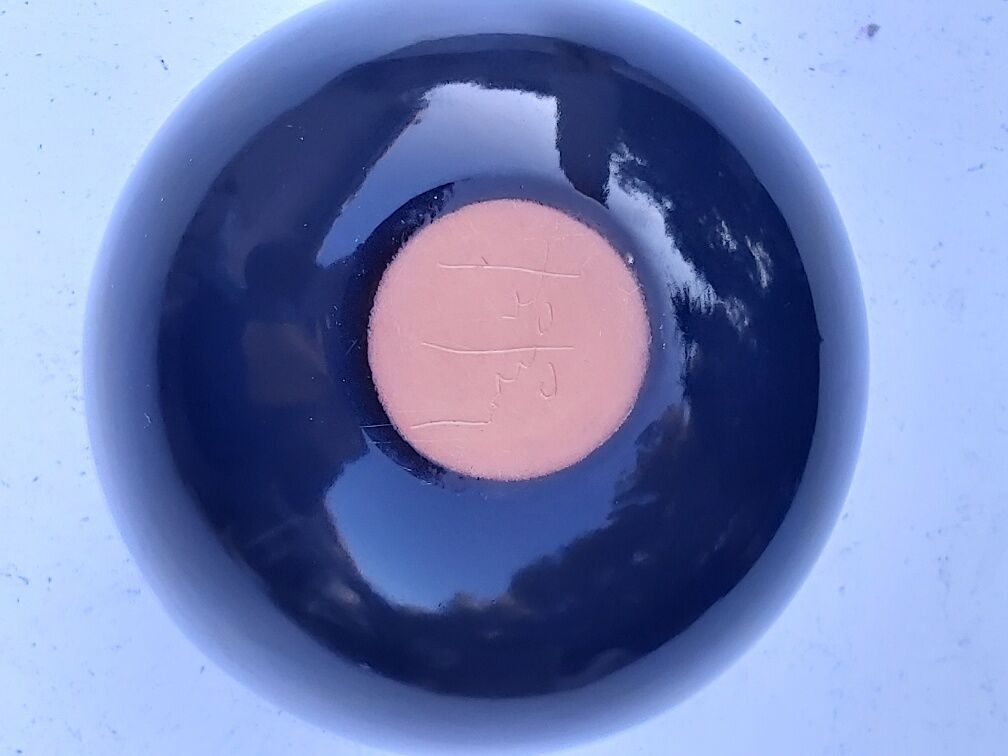 Signed ceramic flower-picker ball