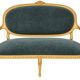 Antique Louis XVI style salon in gilded wood, with medallion backs.