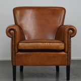 Fauteuil en cuir de mouton à l'aspect luxueux