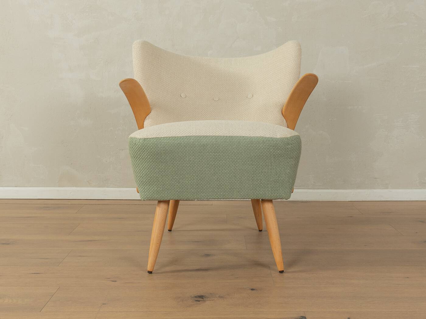 Wonderful armchair in two-tone look from the 1950s