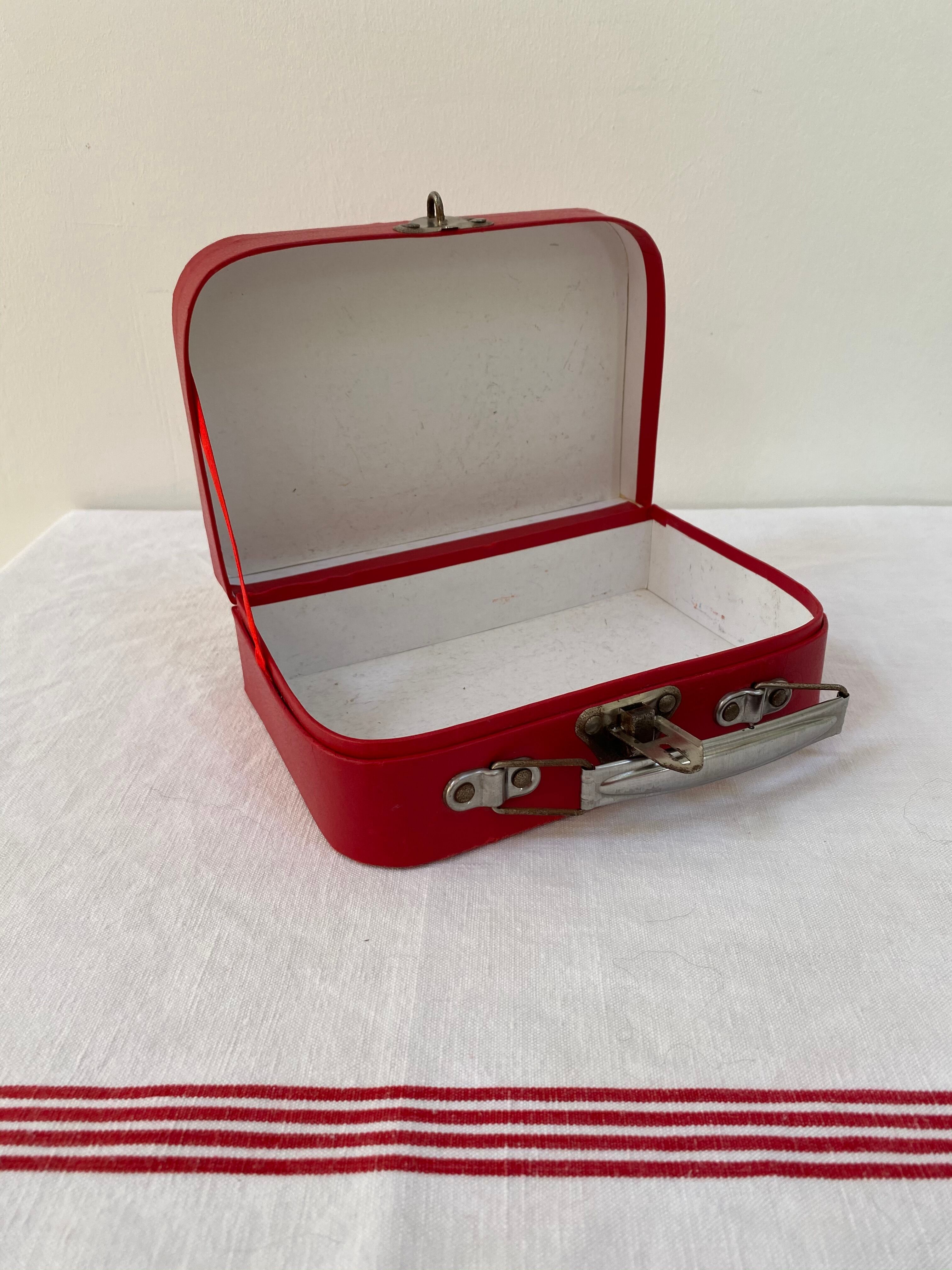 Red suitcase from the 60s