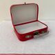Red suitcase from the 60s