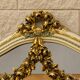 Large Louis XVI style mirror in lacquered wood and gilded wood from around 1900.