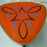 Plant holder tripod in geometrically patterned orange formica