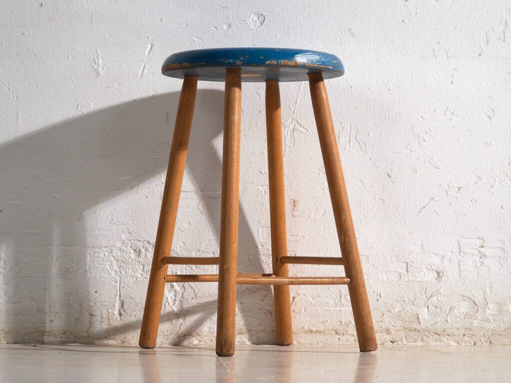 Antique wooden stool with a round seat – Central Europe, around 1950