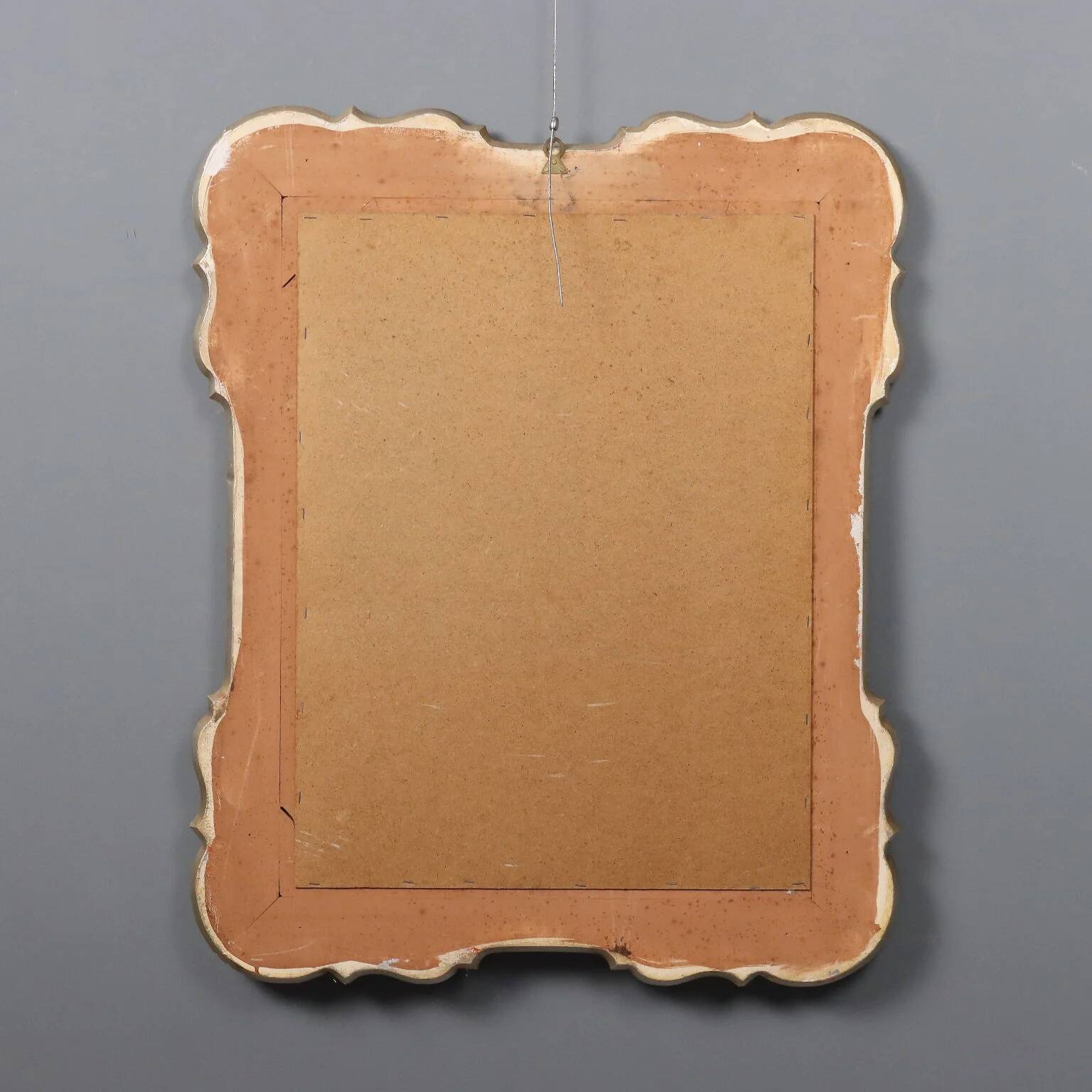 Antique mirror with a gilded frame and floral decorations, Italy, 20th century.