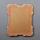 Antique mirror with a gilded frame and floral decorations, Italy, 20th century.