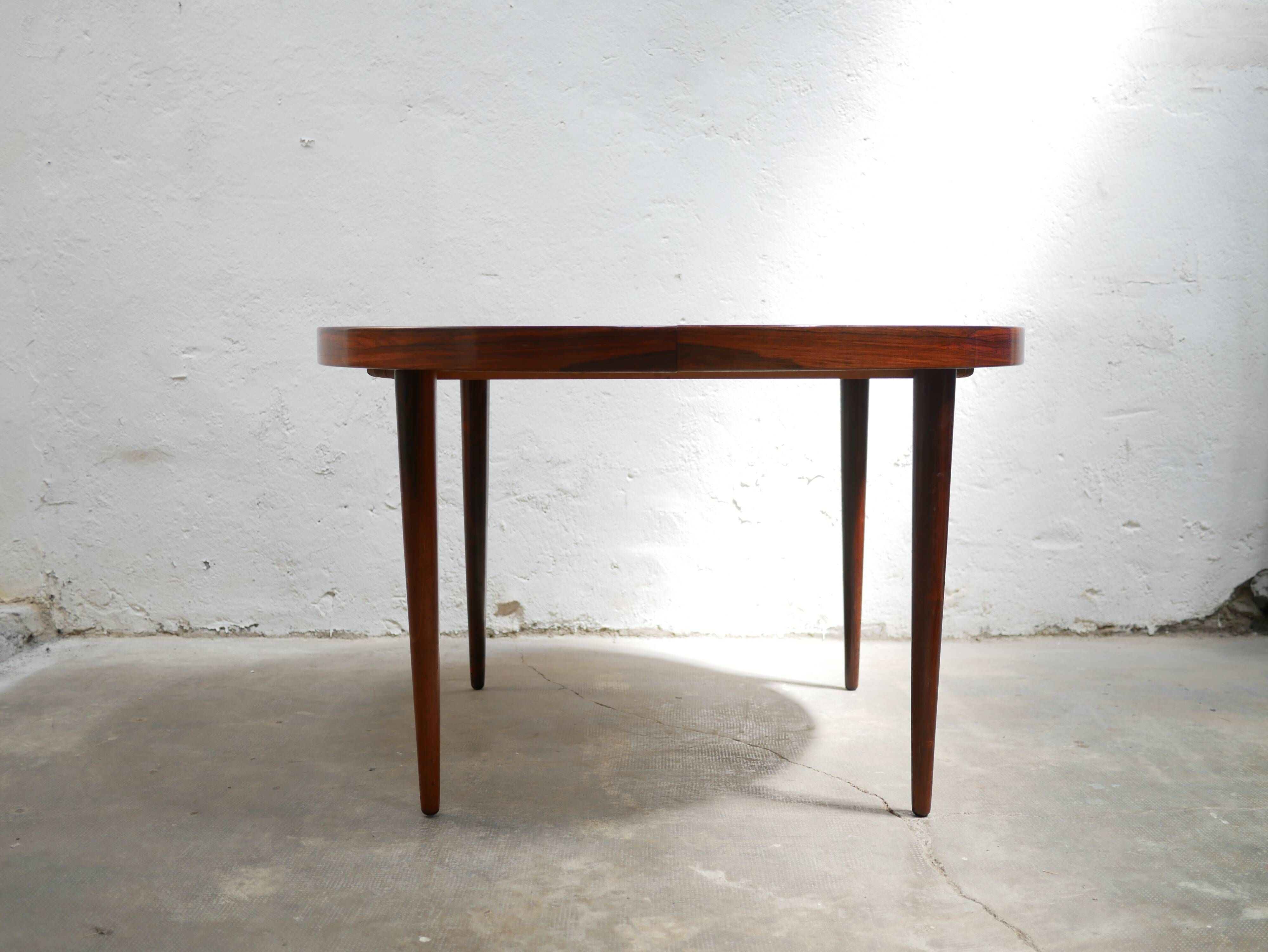 Vintage rosewood extendable Scandinavian round table by Kai Kristiansen for Skovmand and Anders