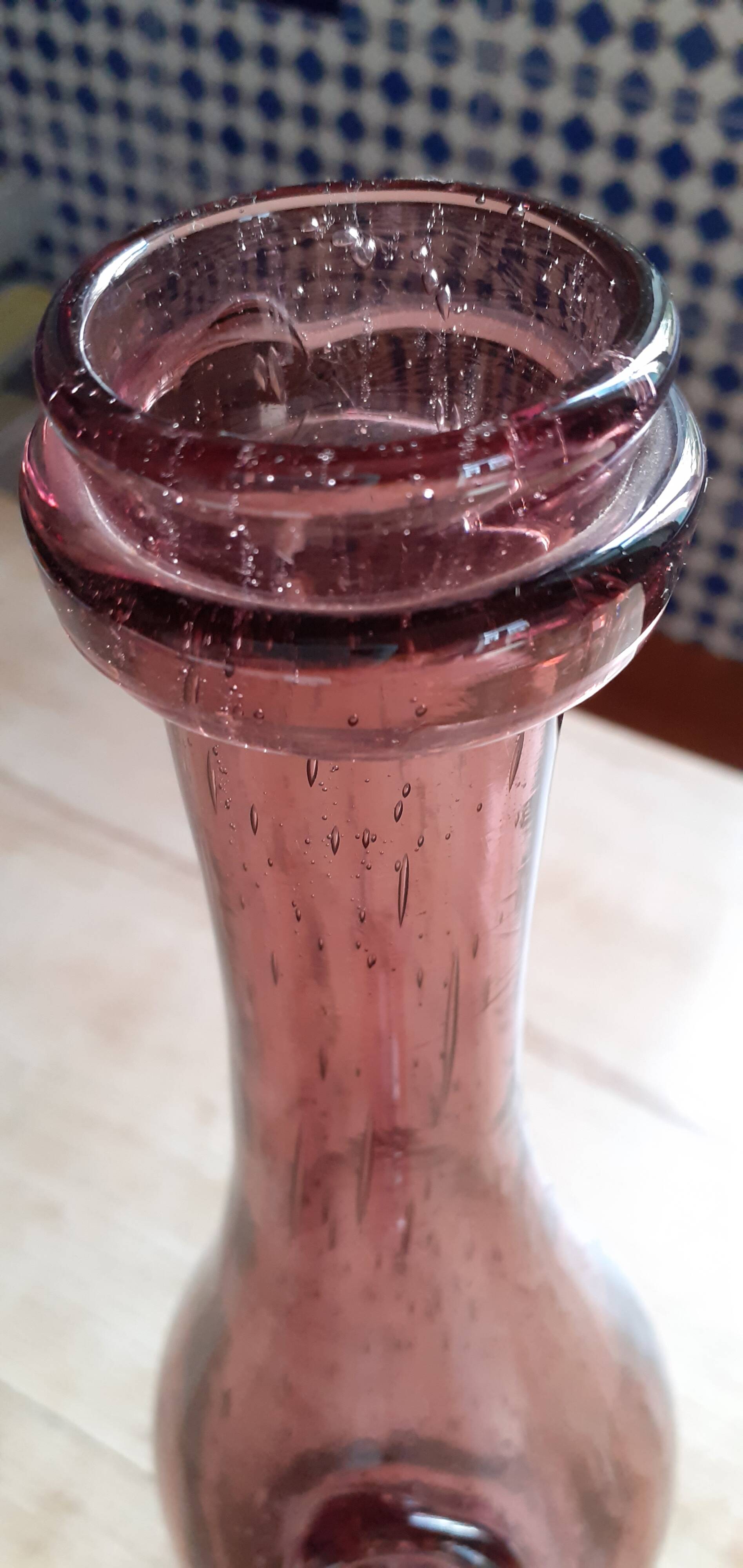 Old long Biot glass bottle