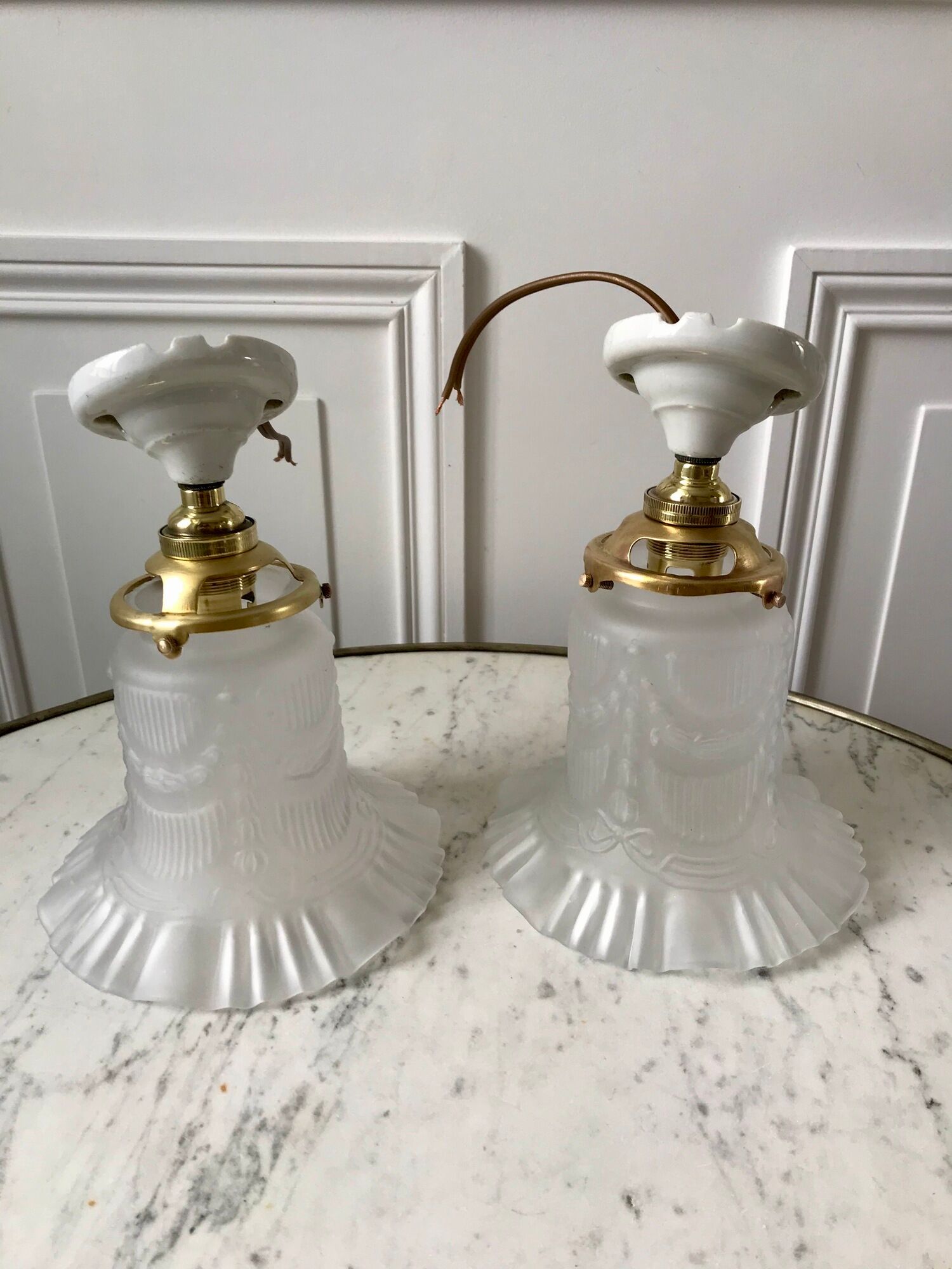 Pair of tulip wall lamps in molded glass on porcelain support 20s