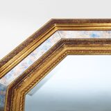 Gilded octagonal mirror by Deknudt Belgium decorated with smoked mirror gla