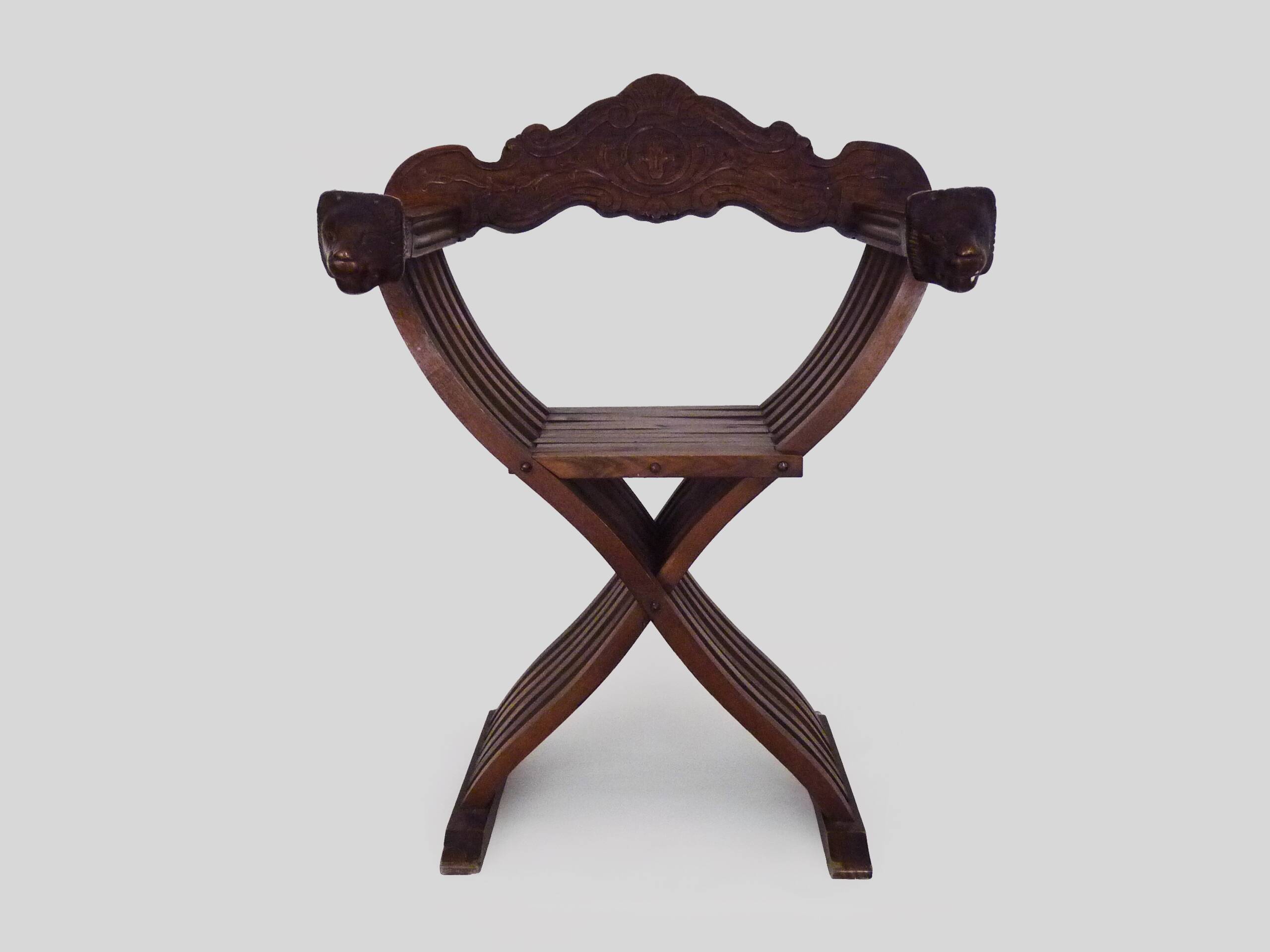 Vintage Savonarola chair with lion head, wood, Italy, 1950s