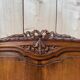 Lit corbeille  noyer sculpté de style Louis XVI