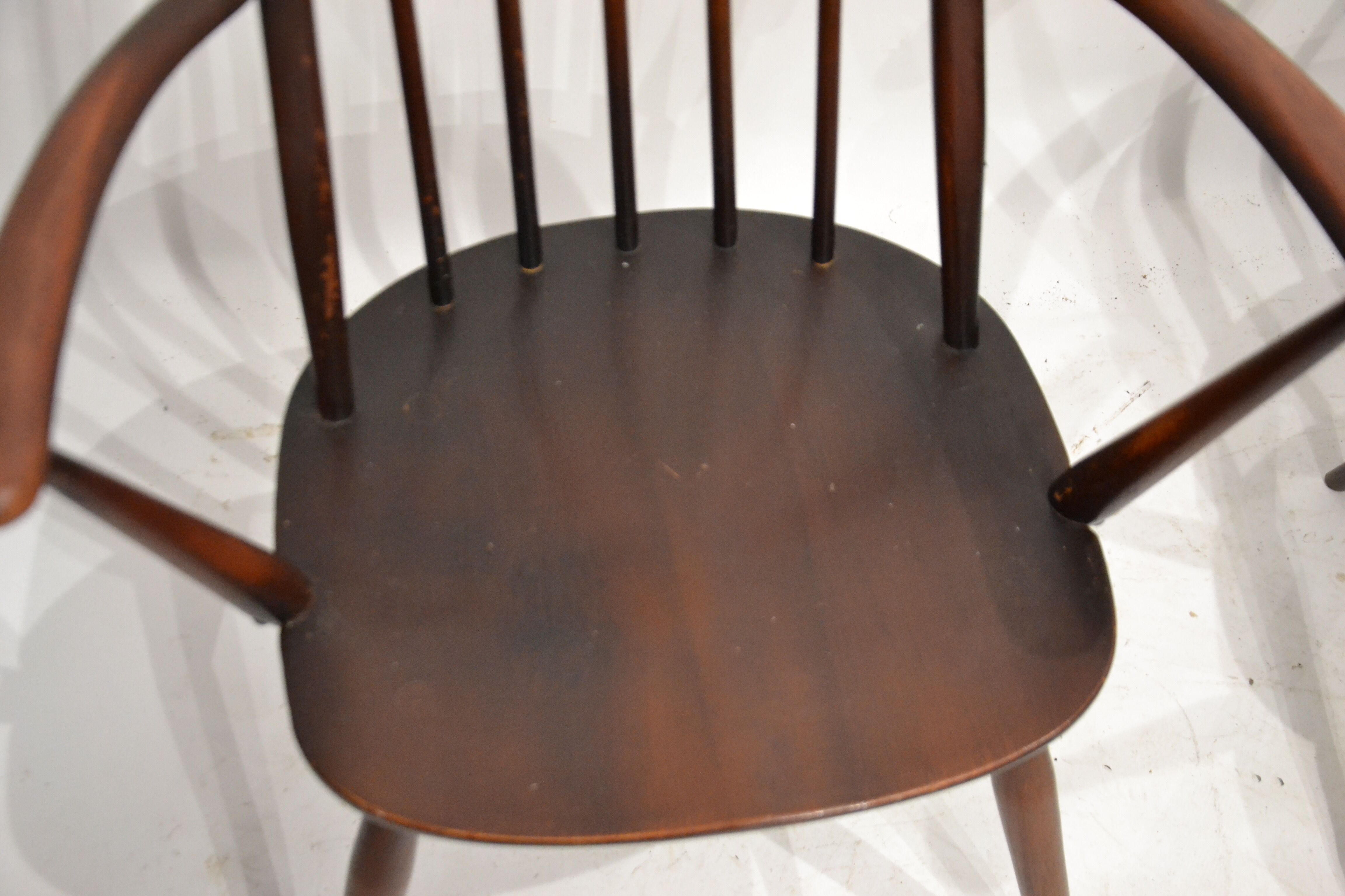 Pair of Ercol chairs with armrests