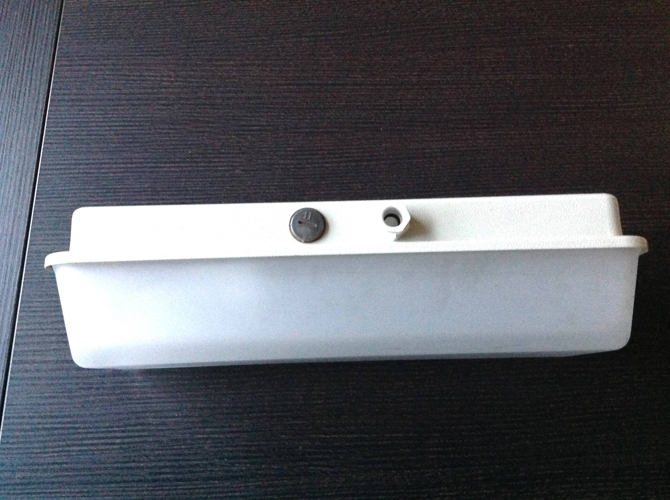 Rectangular porthole wall light in industrial/70s style frosted glass