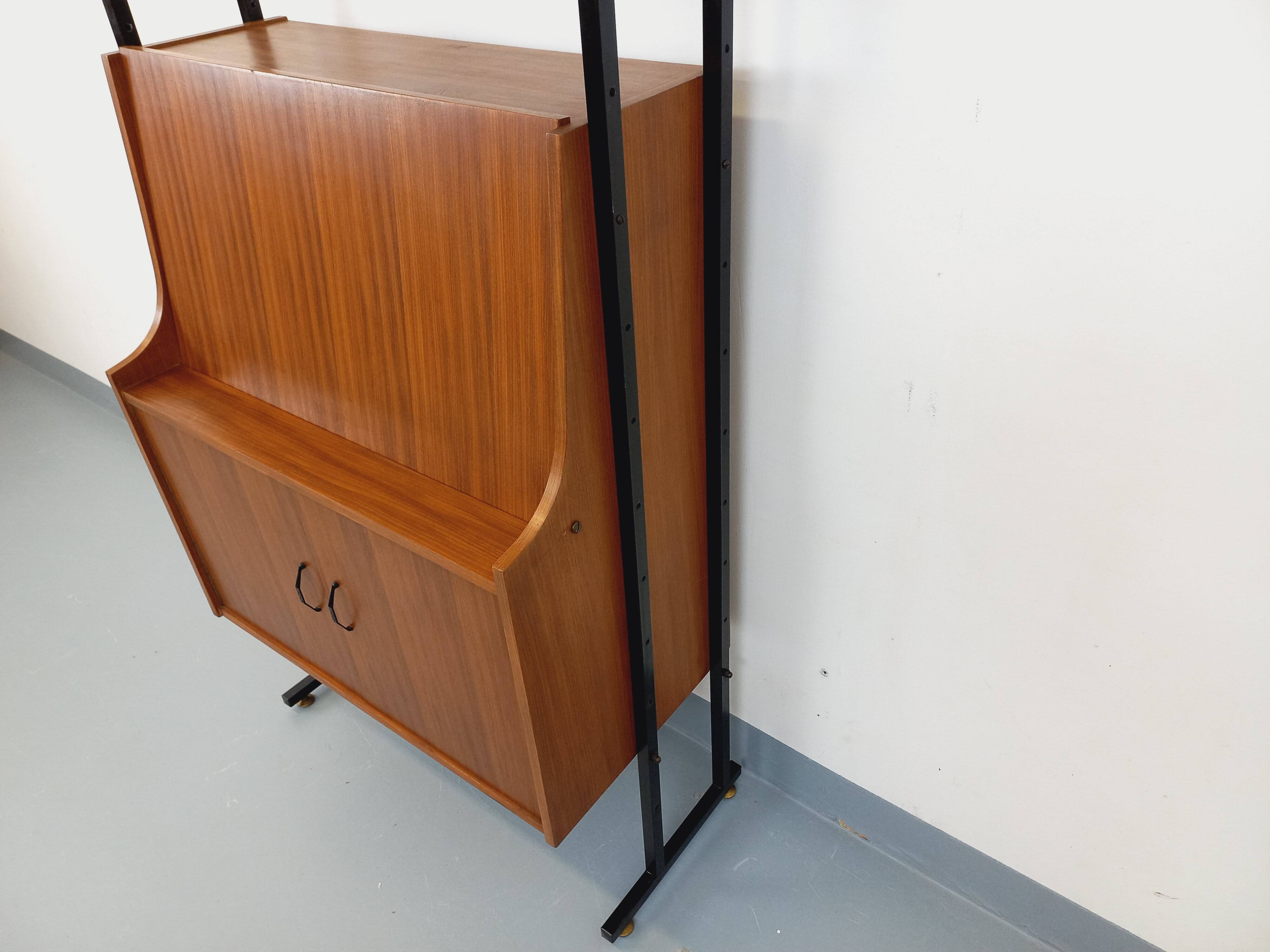Vintage modular secretary bookshelf in teak and metal.