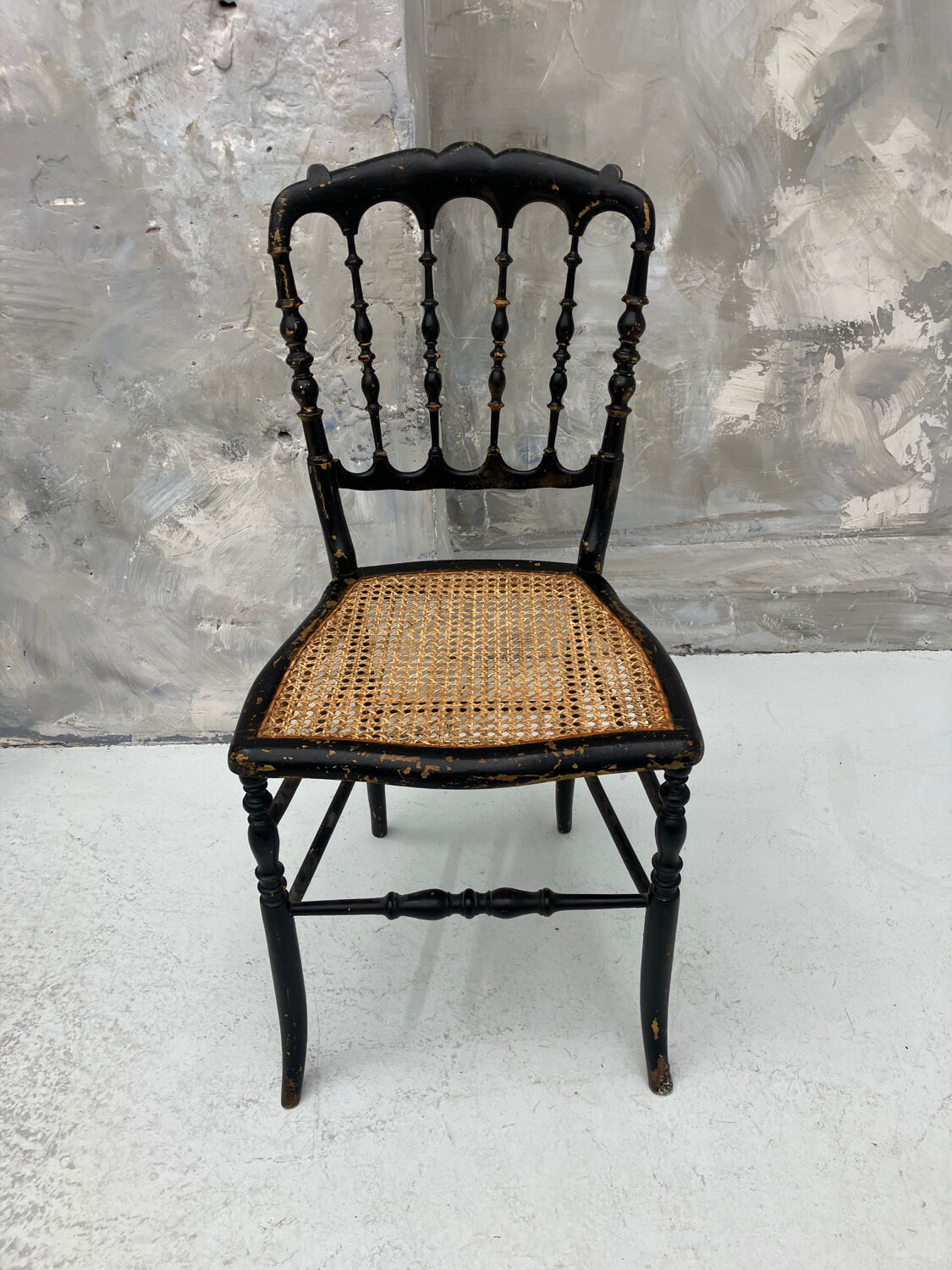 Napoleon III chair in blackened wood and cane