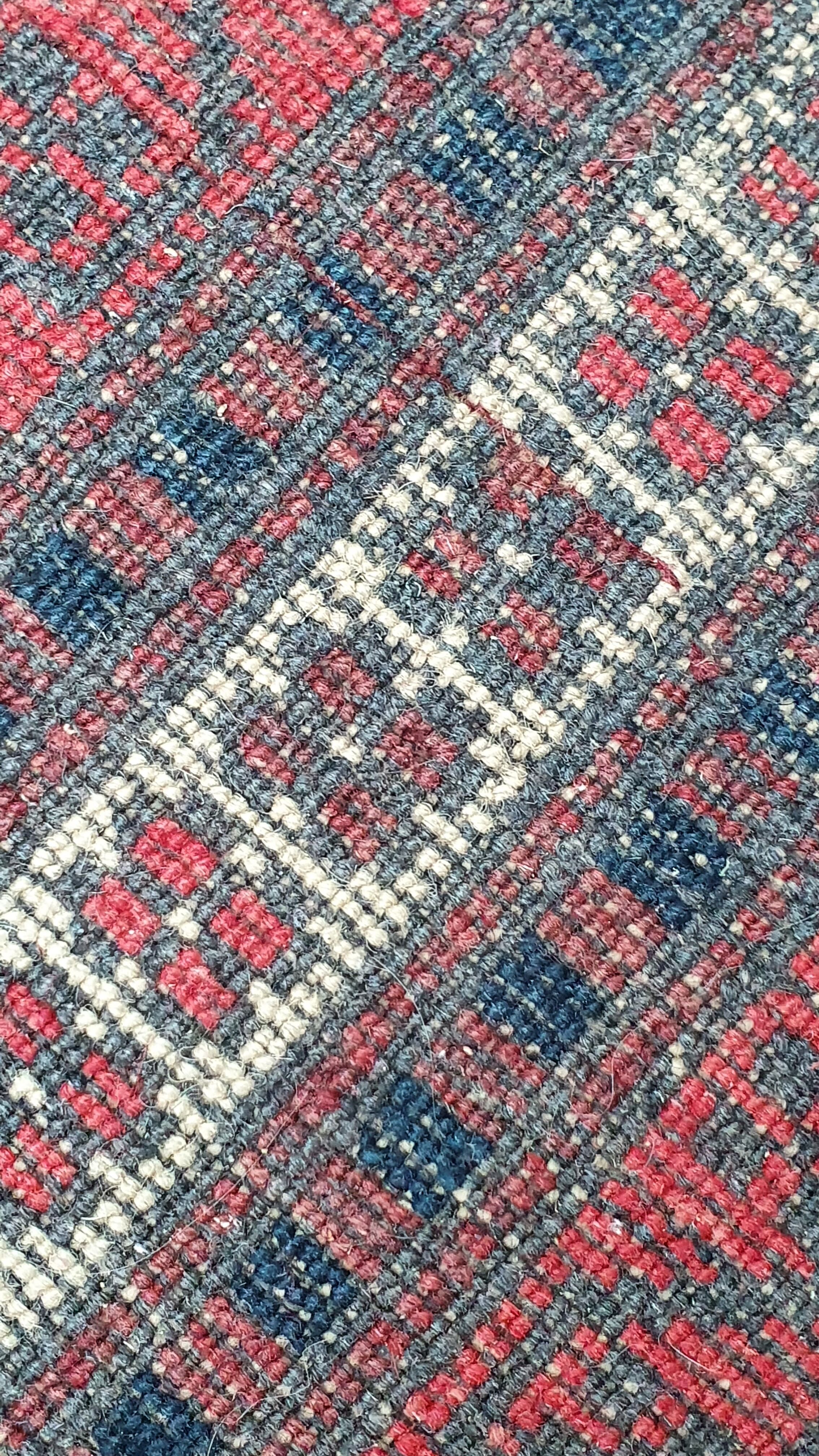 Old hand-knotted wool carpet