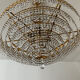 Chandelier cascade of tassels and brass