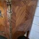 Louis XV style curved chest of drawers in marquetry