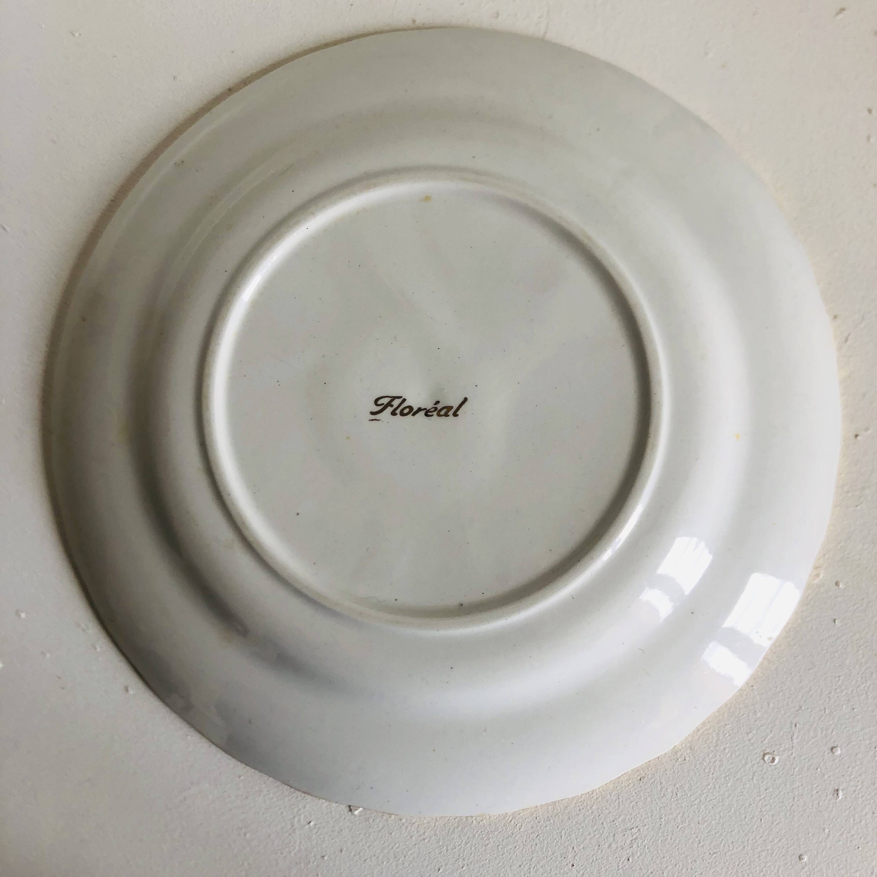 Plate by Amandinoise with a floral art deco rose motif.