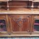 Louis XVI two-body buffet in carved walnut, 19th century.