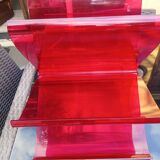 Kartell red magazine rack